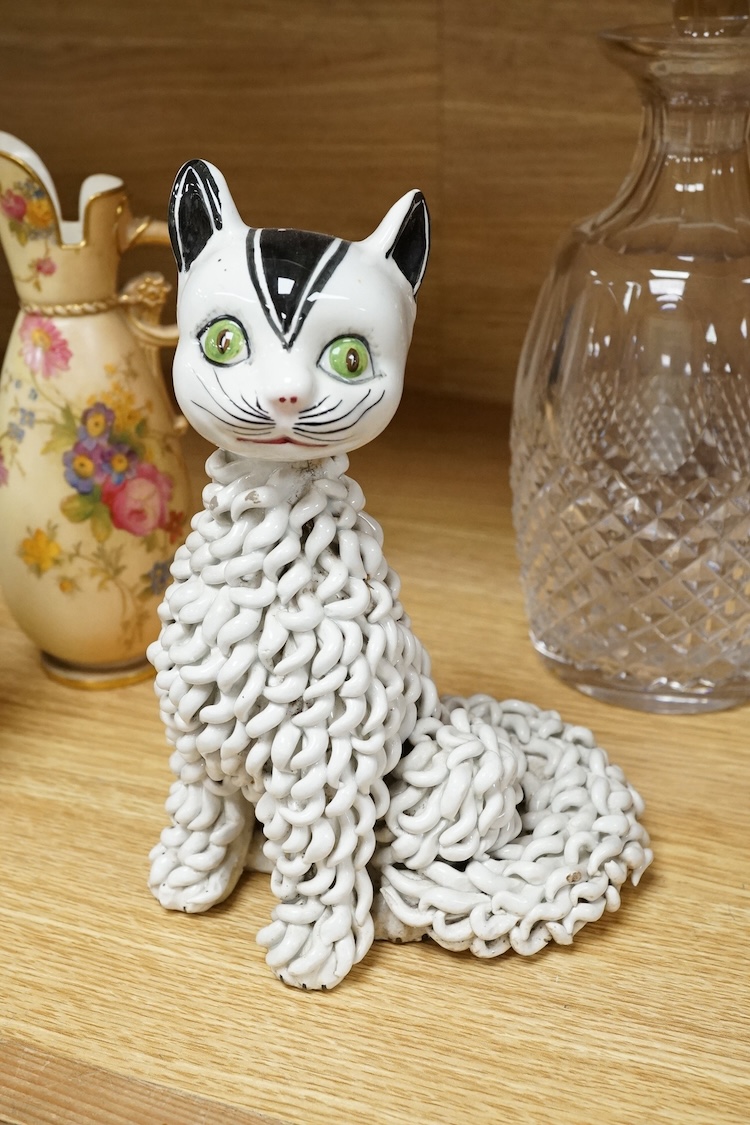 A pair of Worcester blush miniature ewers, an Italian pottery cat and a glass decanter and stopper, decanter 27cm high